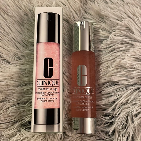 Clinique moisture surge. BNIB. 1.6 oz. Opened box for pictures. Never used. - Picture 1 of 3